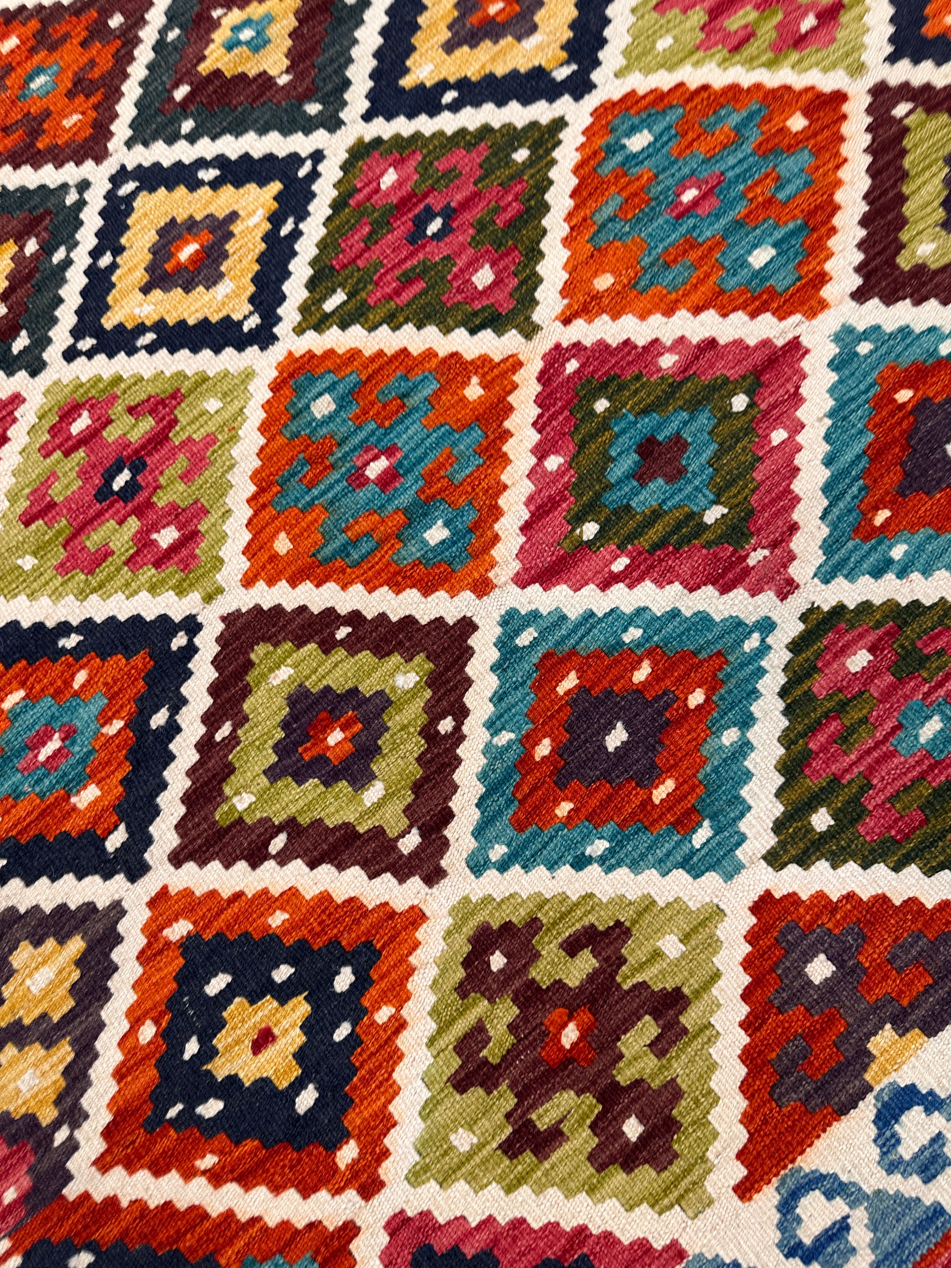 5'1" x 6'7" Handwoven Wool Kilim Rug – Colorful Geometric Tribal Flatweave with Decorative Bound Fringe – Reversible