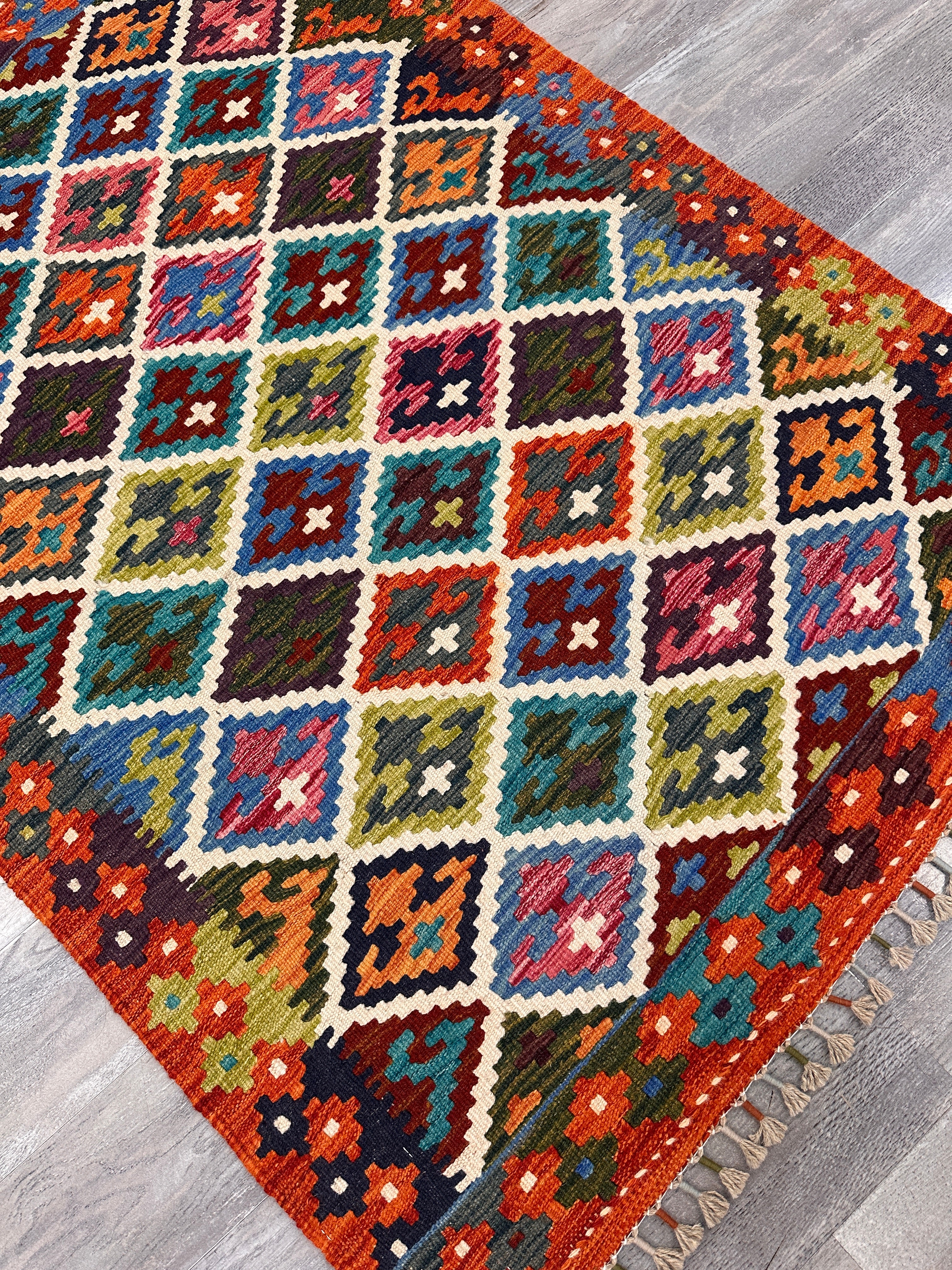 Handwoven Wool Kilim Rug 3'6" x 4'10" – Colorful Geometric Tribal Flatweave with Decorative Bound Fringe – Reversible