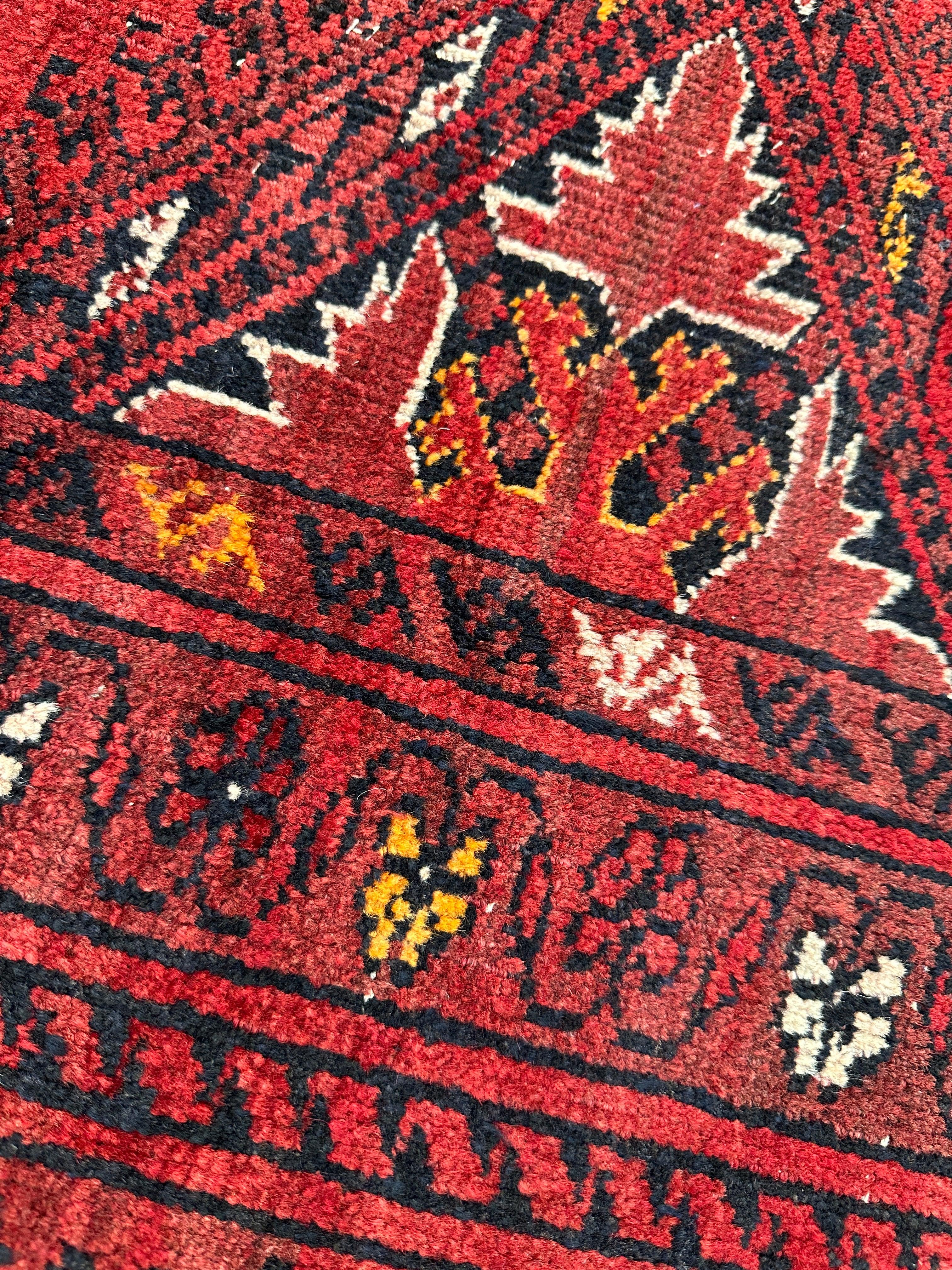 Hand-Knotted Afghan Turkoman Waziri Wool Rug – 6'9" x 9'6" – Vintage Red Elegance