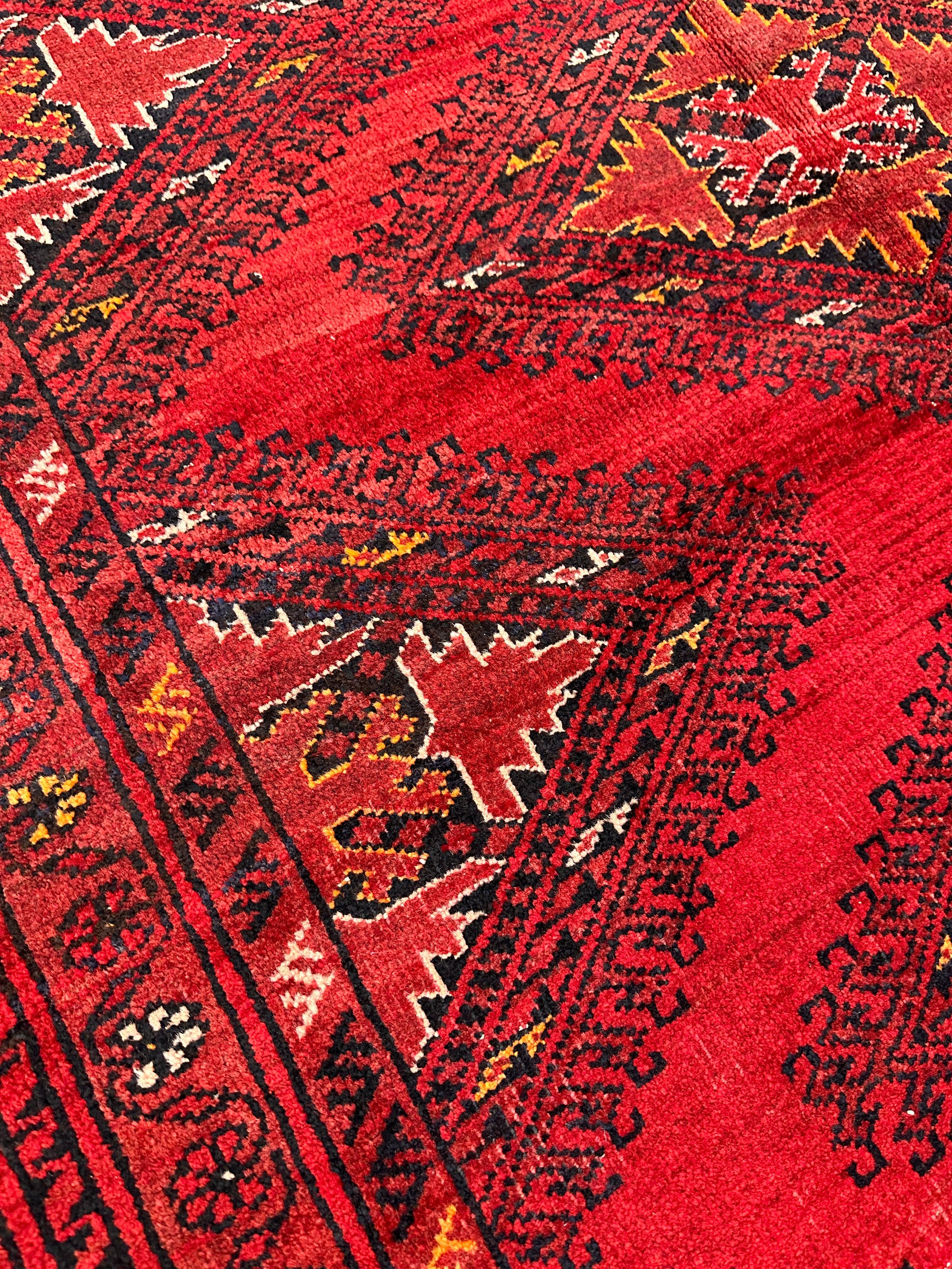 Hand-Knotted Afghan Turkoman Waziri Wool Rug – 6'9" x 9'6" – Vintage Red Elegance
