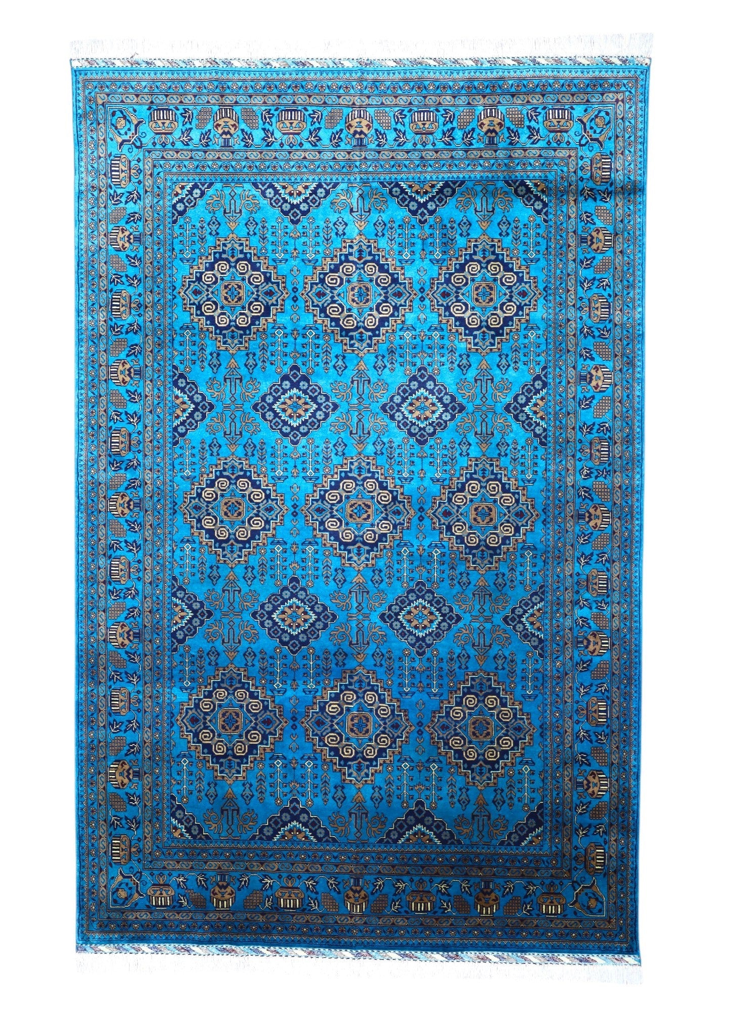 Blue patterned rug on a white background
